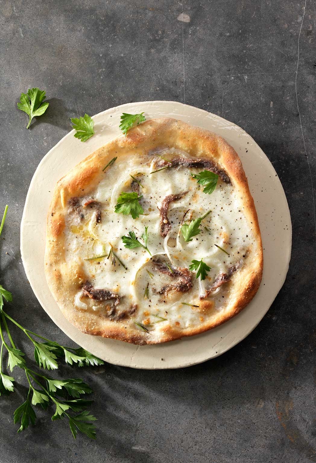 Pizzadeeg met parmezaanse kaas en oregano
